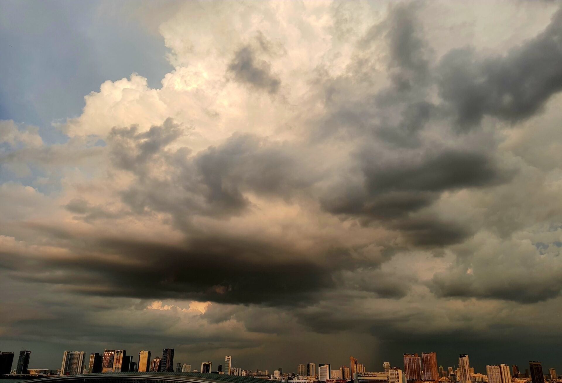 dramatic-storm-clouds-city-skyline