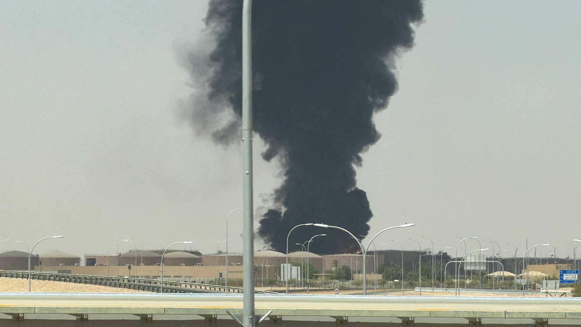 Large plume of black smoke rises from the fuel storage area at King Khalid International Airport, in Riyadh