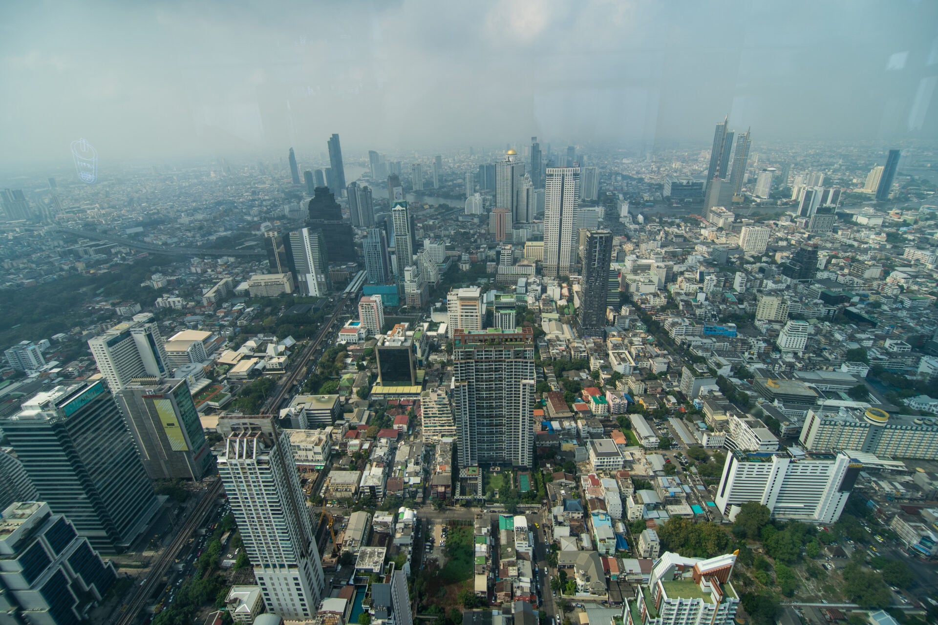 Bangkok, Thailand - January, 2020: Panoramic skyline view of Bangkok from above from The Peak of the King Power MahaNakhon 78 floors skyscraper, Thailands highest outdoor observation area