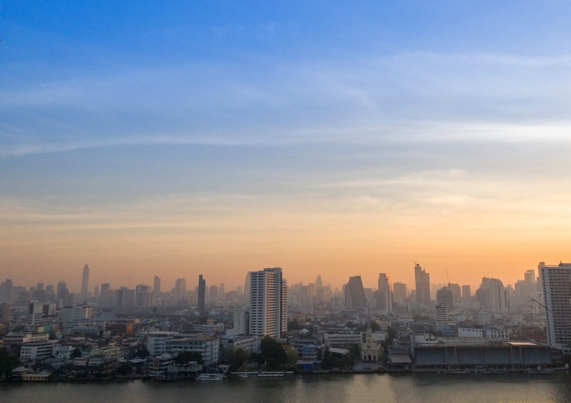 Morning view landscape at Chao Phraya River with orange blue sky