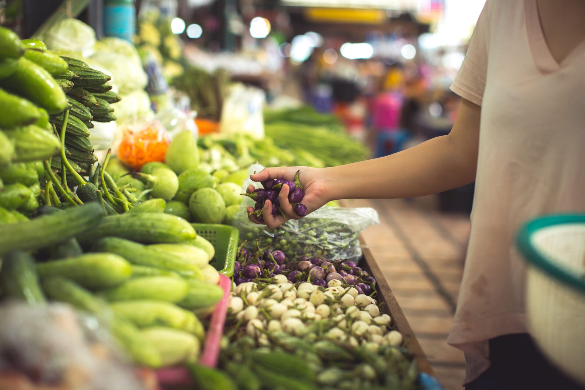 woman shopping organic veggies and fruits